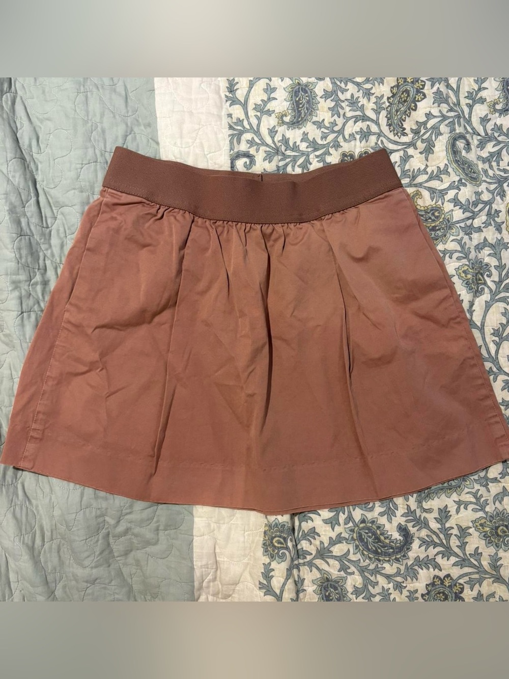 rose colored mini skirt with pockets!!